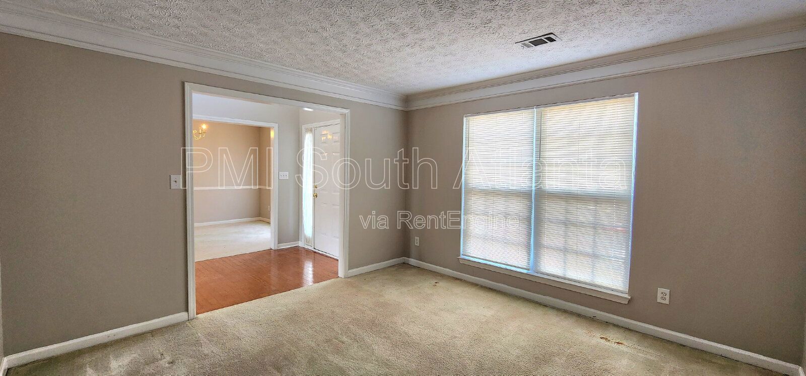 3BR / 2.5BA Two-Story Home with Soaring Living Room, Fireplace, Updated Kitchen with Gas Stove, and Private Backyard Deck – $1,800/Month property image