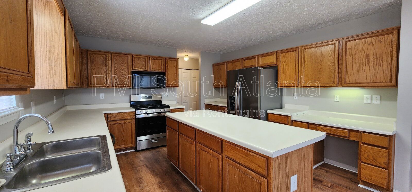 3BR / 2.5BA Two-Story Home with Soaring Living Room, Fireplace, Updated Kitchen with Gas Stove, and Private Backyard Deck – $1,800/Month property image