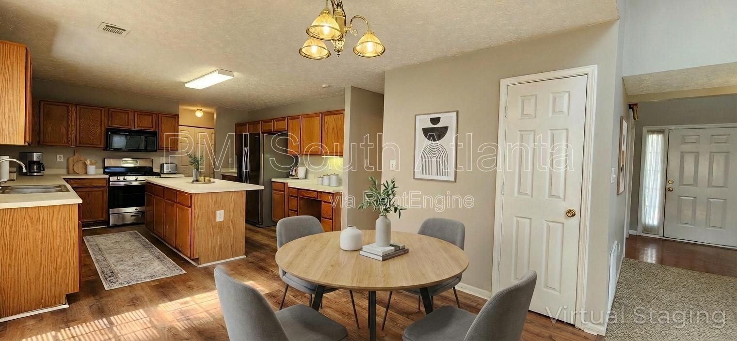 3BR / 2.5BA Two-Story Home with Soaring Living Room, Fireplace, Updated Kitchen with Gas Stove, and Private Backyard Deck – $1,800/Month property image