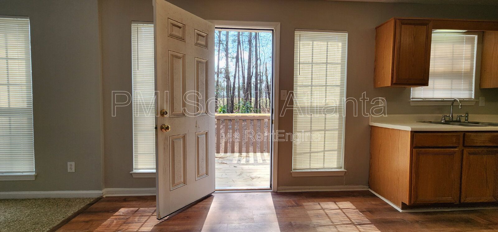 3BR / 2.5BA Two-Story Home with Soaring Living Room, Fireplace, Updated Kitchen with Gas Stove, and Private Backyard Deck – $1,800/Month property image