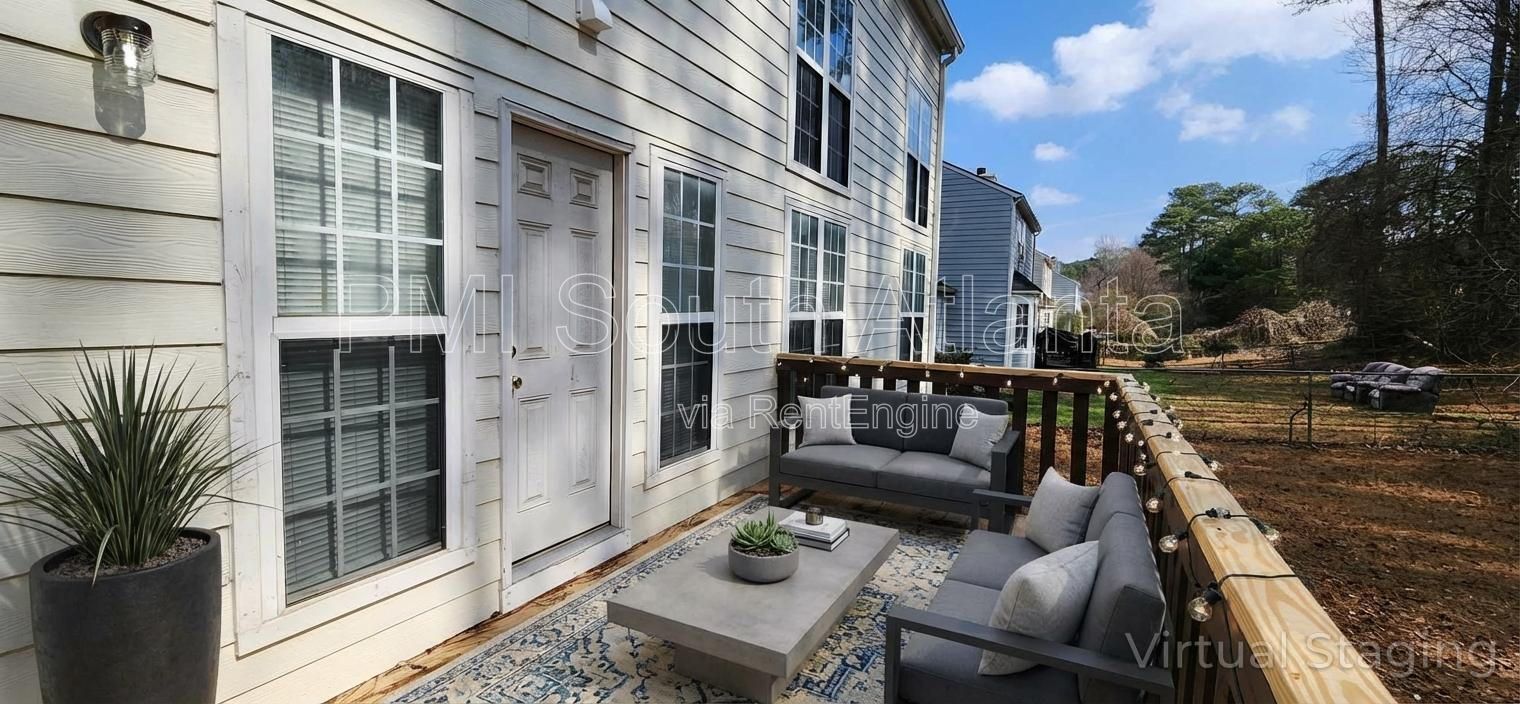 3BR / 2.5BA Two-Story Home with Soaring Living Room, Fireplace, Updated Kitchen with Gas Stove, and Private Backyard Deck – $1,800/Month property image