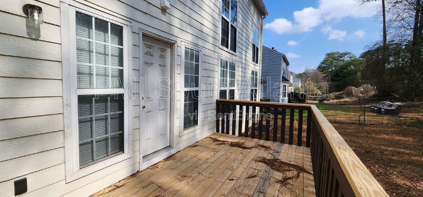 3BR / 2.5BA Two-Story Home with Soaring Living Room, Fireplace, Updated Kitchen with Gas Stove, and Private Backyard Deck – $1,800/Month property image