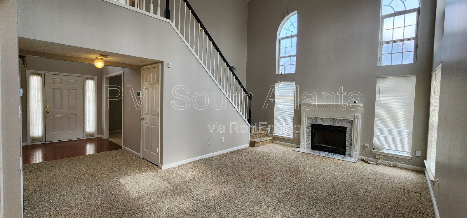 3BR / 2.5BA Two-Story Home with Soaring Living Room, Fireplace, Updated Kitchen with Gas Stove, and Private Backyard Deck – $1,800/Month property image