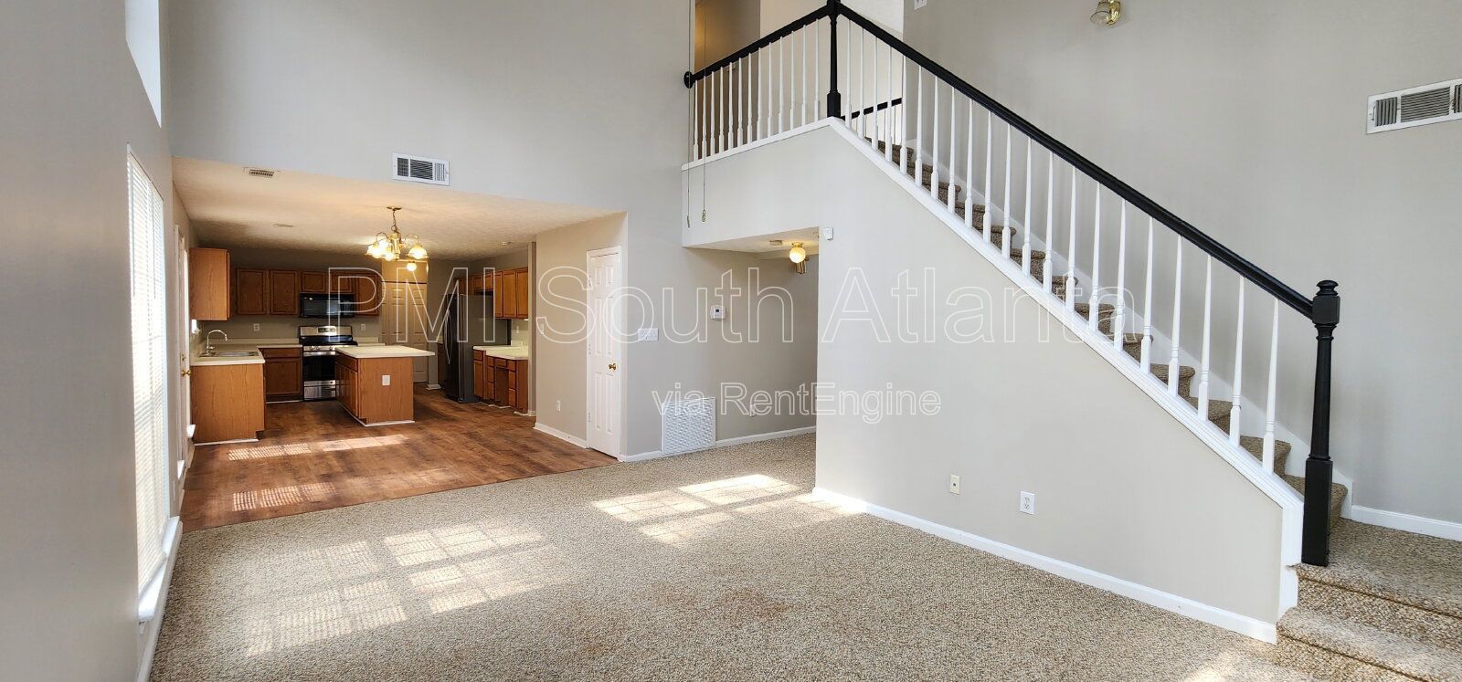 3BR / 2.5BA Two-Story Home with Soaring Living Room, Fireplace, Updated Kitchen with Gas Stove, and Private Backyard Deck – $1,800/Month property image