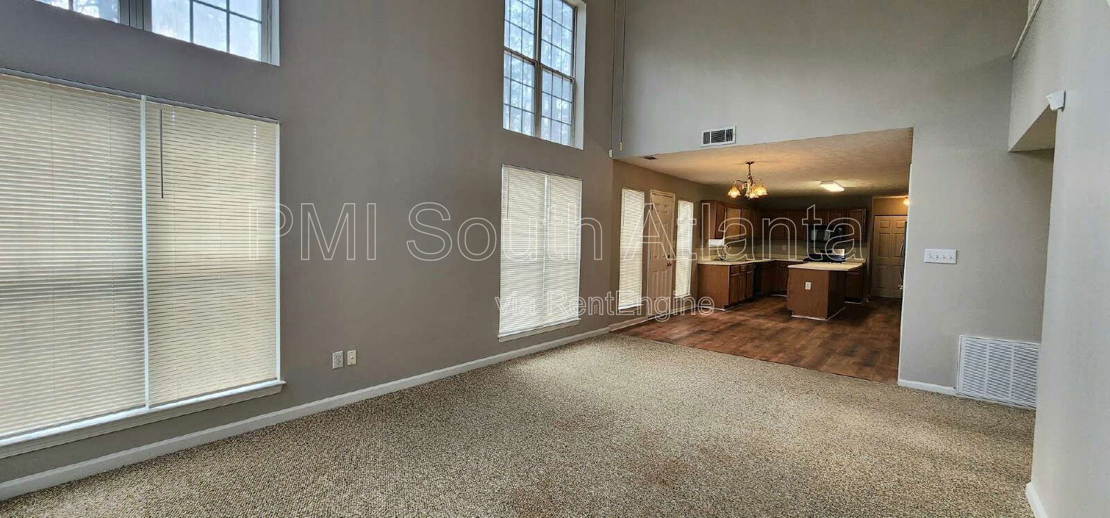 3BR / 2.5BA Two-Story Home with Soaring Living Room, Fireplace, Updated Kitchen with Gas Stove, and Private Backyard Deck – $1,800/Month property image