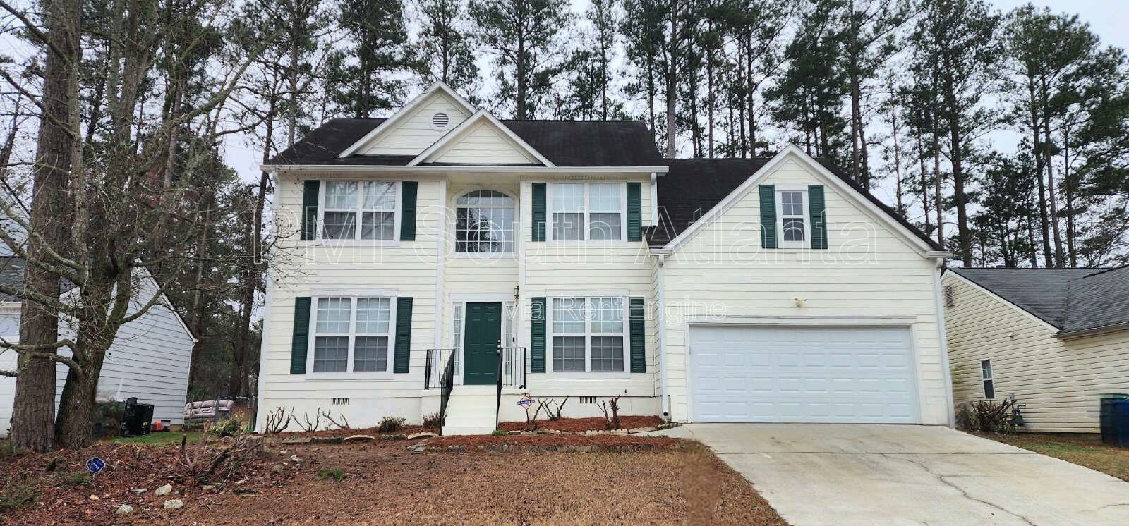 3BR / 2.5BA Two-Story Home with Soaring Living Room, Fireplace, Updated Kitchen with Gas Stove, and Private Backyard Deck – $1,800/Month property image