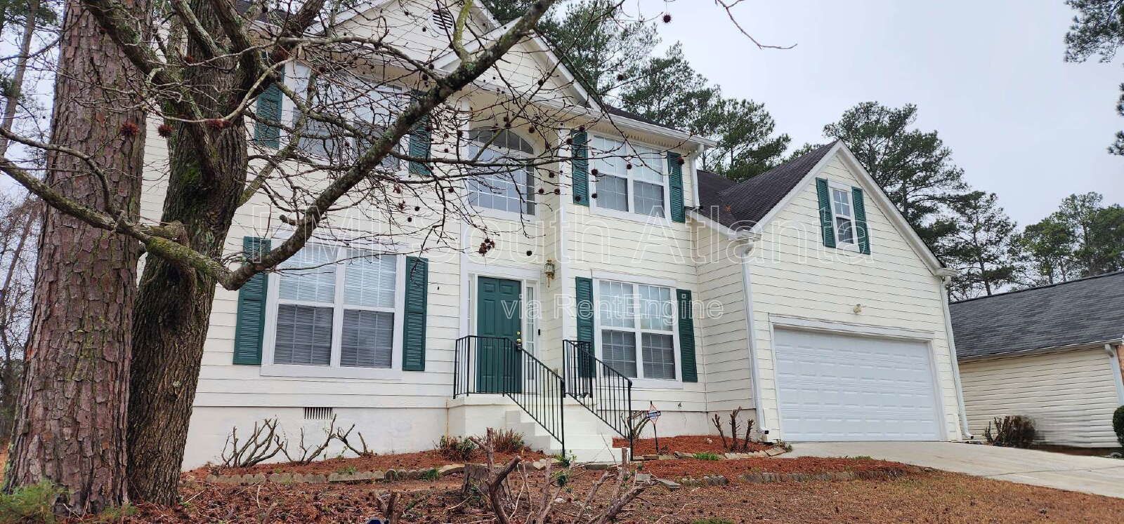 3BR / 2.5BA Two-Story Home with Soaring Living Room, Fireplace, Updated Kitchen with Gas Stove, and Private Backyard Deck – $1,800/Month property image