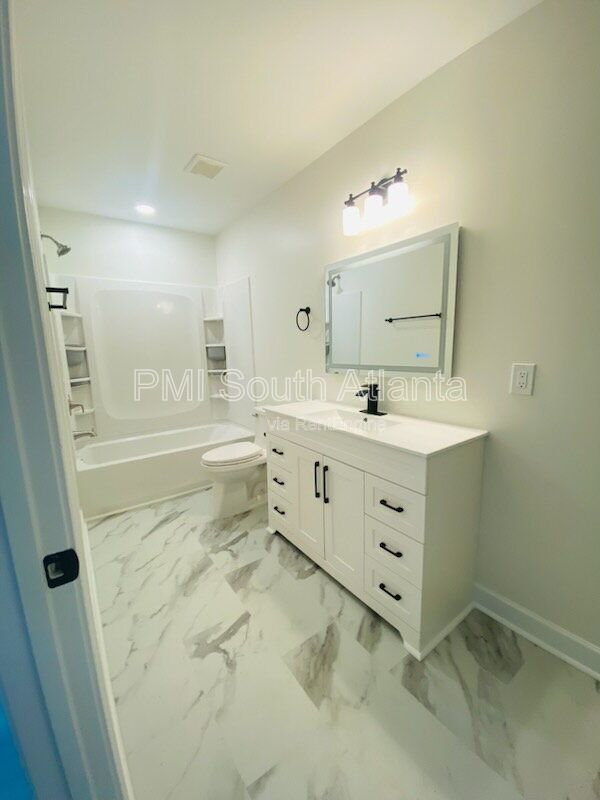 NEW CONSTRUCTION 4 Bedroom Modern Ranch Home for Rent in Vibrant Historic Downtown Jonesboro! | Pet Friendly | Available Now! property image