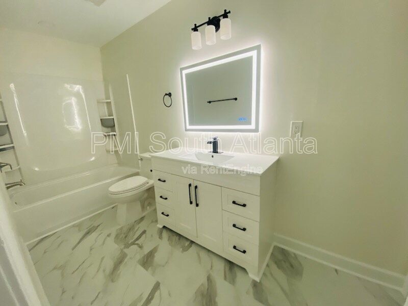 NEW CONSTRUCTION 4 Bedroom Modern Ranch Home for Rent in Vibrant Historic Downtown Jonesboro! | Pet Friendly | Available Now! property image