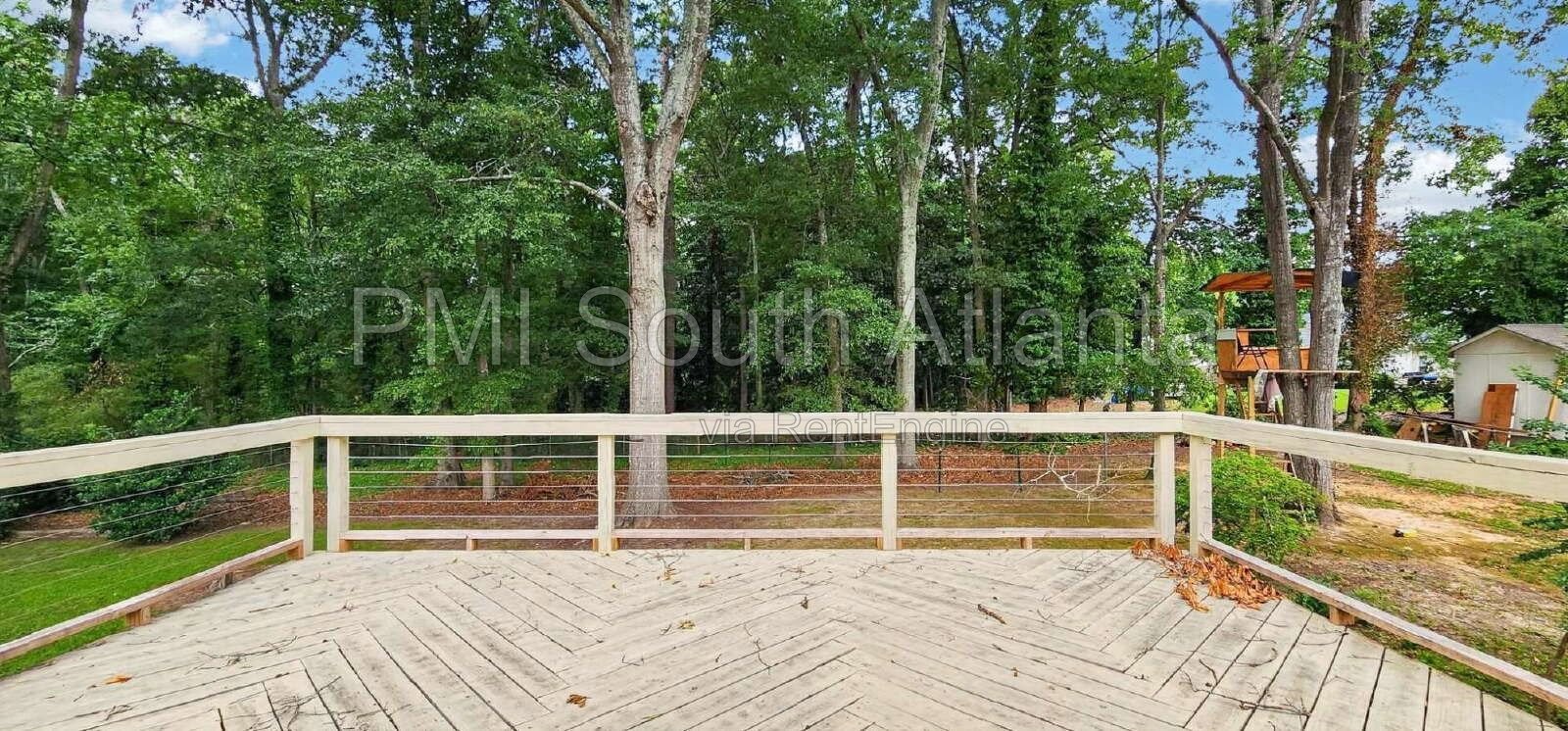 Renovated 4-Bedroom Split-Level Home with Expansive Deck & Private Backyard | Jonesboro, GA | $2,090/Month property image