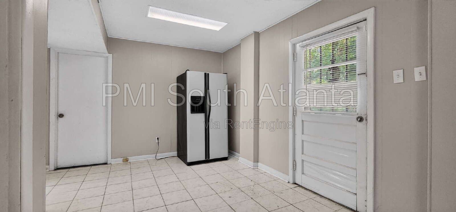 Renovated 4-Bedroom Split-Level Home with Expansive Deck & Private Backyard | Jonesboro, GA | $2,090/Month property image